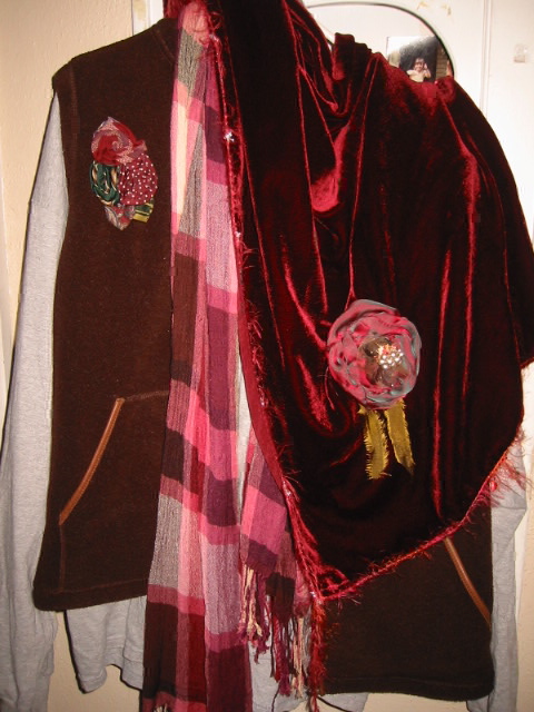 the pin on left is made from men's vintage ties, my Granny's pearl earring is in silk rose's center
